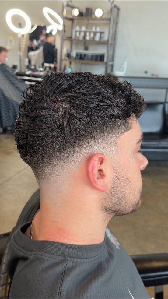 Mid drop fade with curly top