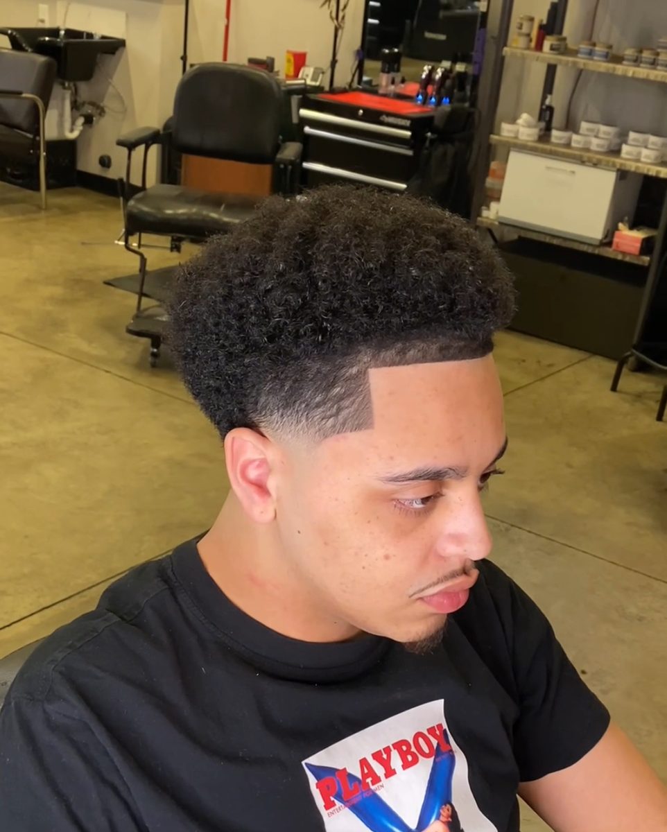 Sponged afro with low taper and crispy line up