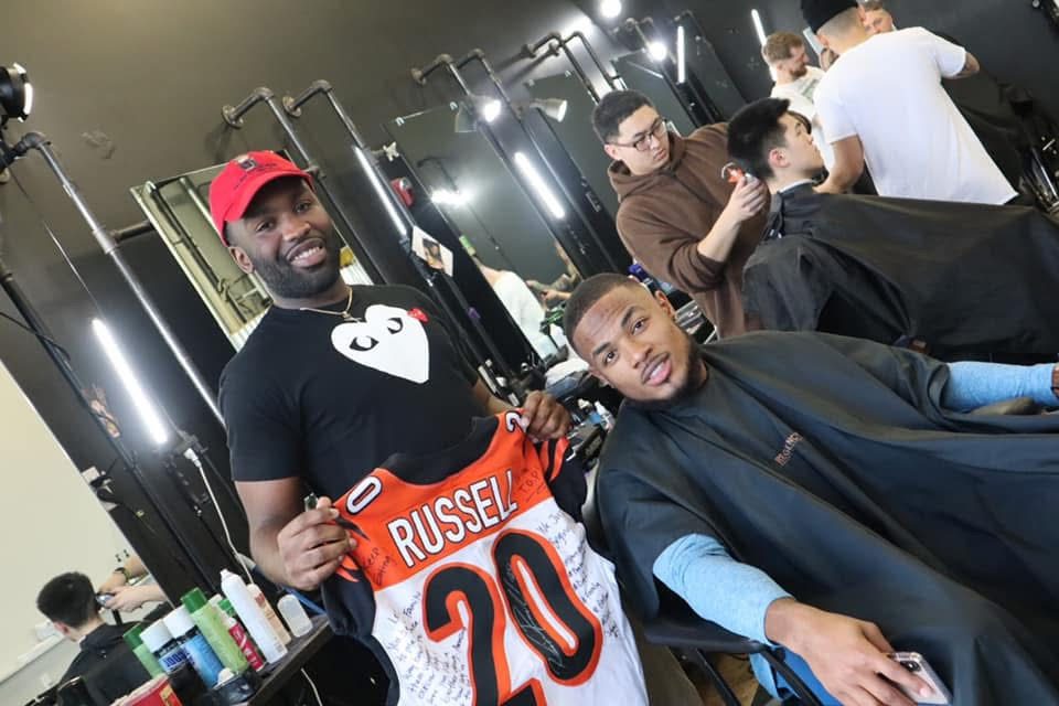 Signed jersey moment at the shop
